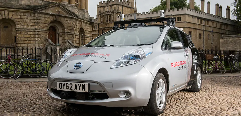 Robot car parked in front of the Radcliffe Camera. 