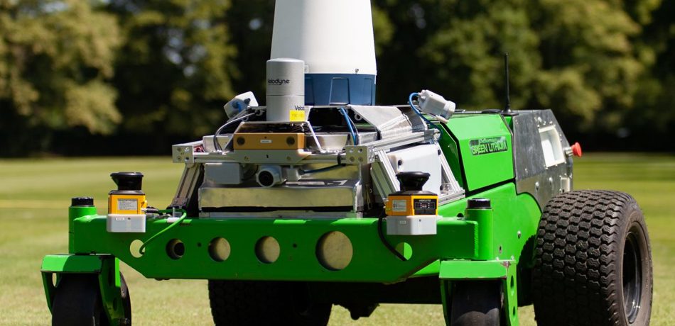 HULK robot on green field of grass. 
