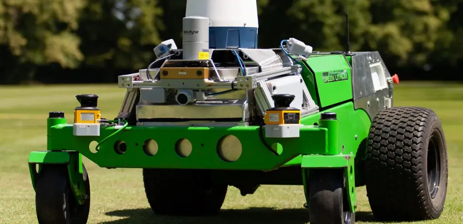 HULK robot on green field of grass.