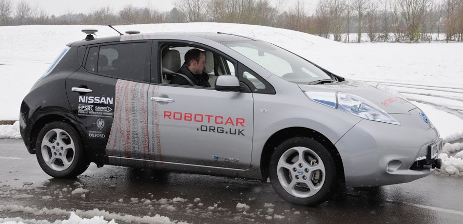 A robot car driving in the rain