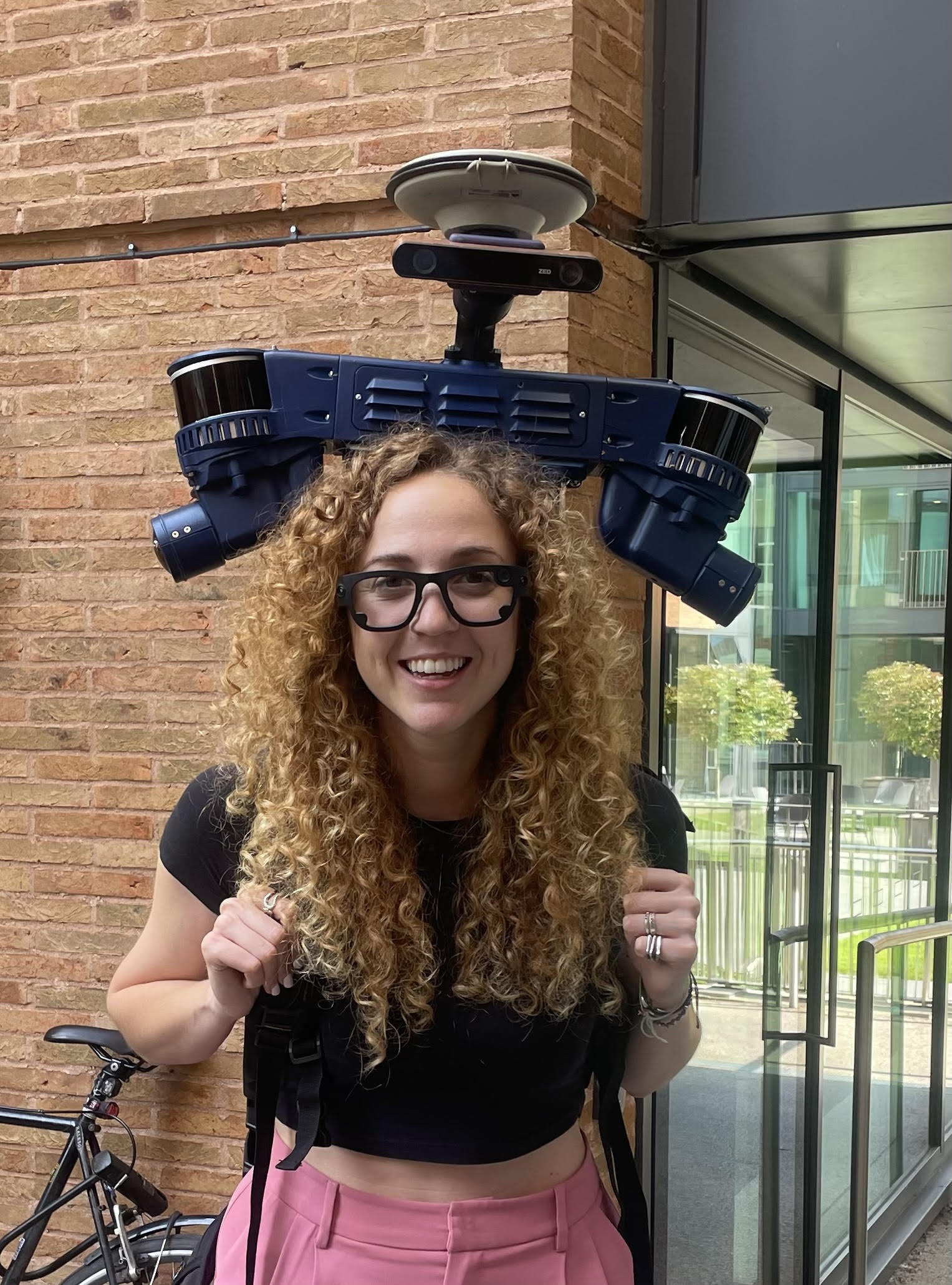 Efimia Panagiotaki, a DPhil student in the Mobile Robotics Group, 360° sensor backpack and eye-tracking glasses used in the RobotCycle project