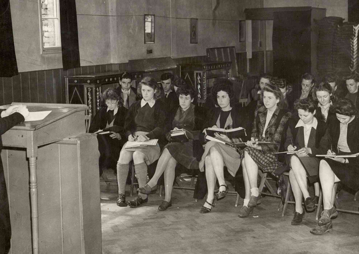 Black and white image showing first Female Students in Oxford.