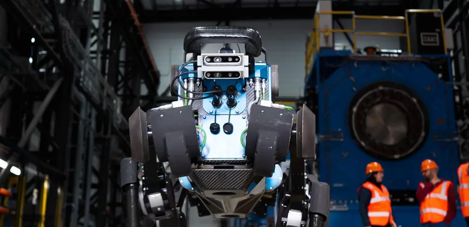blue ANYmal B robot, standing in industrial site.