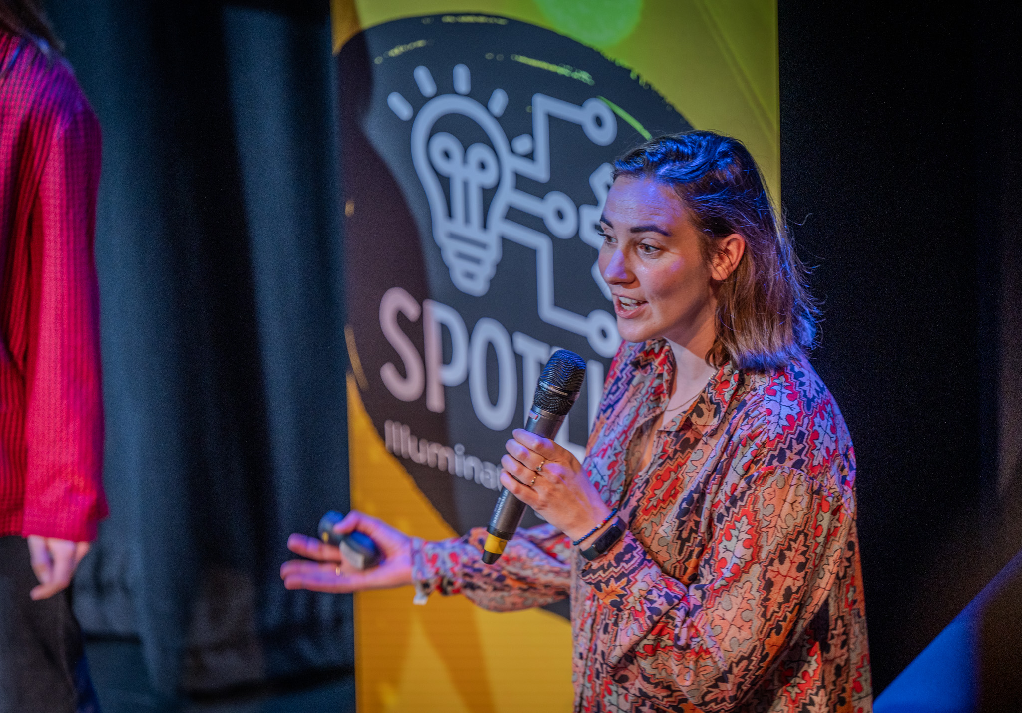 Host of Spotlight: Illuminating Engineering, Dr Veerle Brans introducing talks to the stage